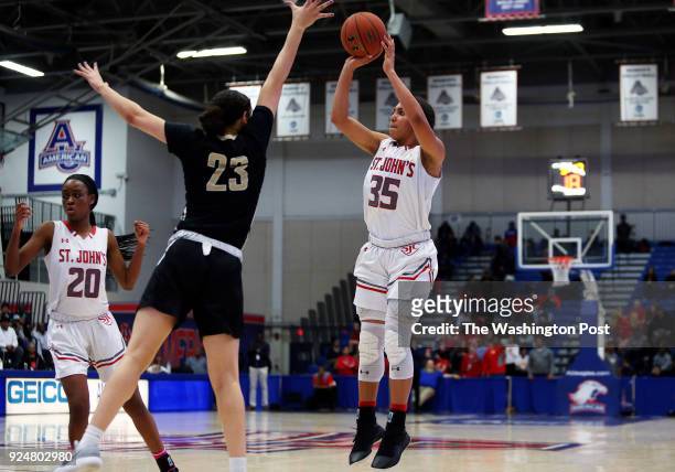St. John's guard Azzi Fudd takes a shot over Paul VI Amira Collins on February 26, 2017 in WASHINGTON, DC during the WCAC Girls Basketball...