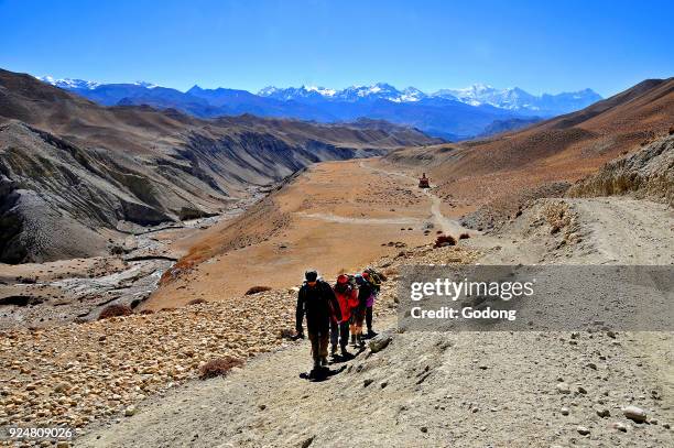 Tourists trekking to Lo Manthang, Mustang. Nepal.