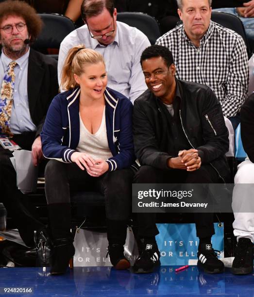 Amy Schumer and Chris Rock attend the New York Knicks Vs Golden State Warriors game at Madison Square Garden on February 26, 2018 in New York City.