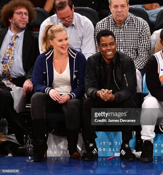 Amy Schumer and Chris Rock attend the New York Knicks Vs Golden State Warriors game at Madison Square Garden on February 26, 2018 in New York City.