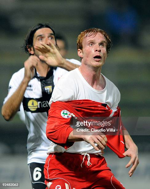 Alessandro Lucarelli of Parma FC battles with Alessandro Gazzi of AS Bari during the Serie A match between Parma FC and AS Bari at Stadio Ennio...