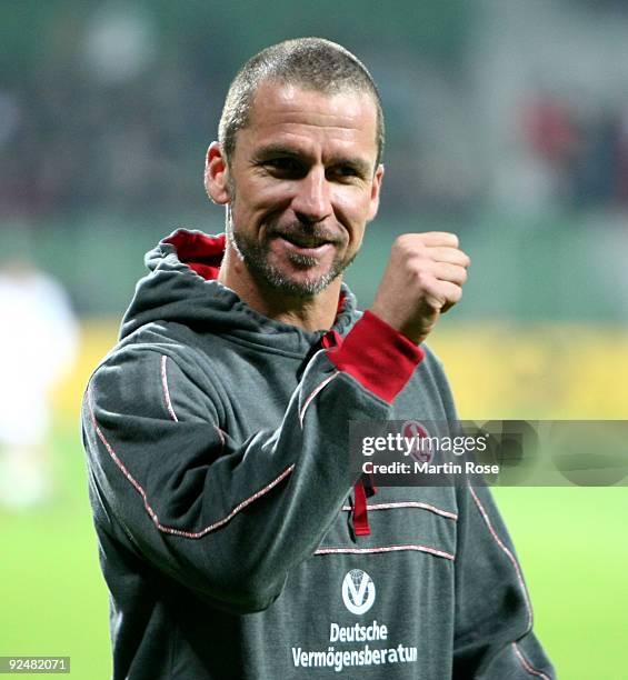 Marco Kurz, head coach of Bremen reacts prior to the DFB Cup third round match between Werder Bremen and 1. FC Kaiserslautern at the Weser stadium on...