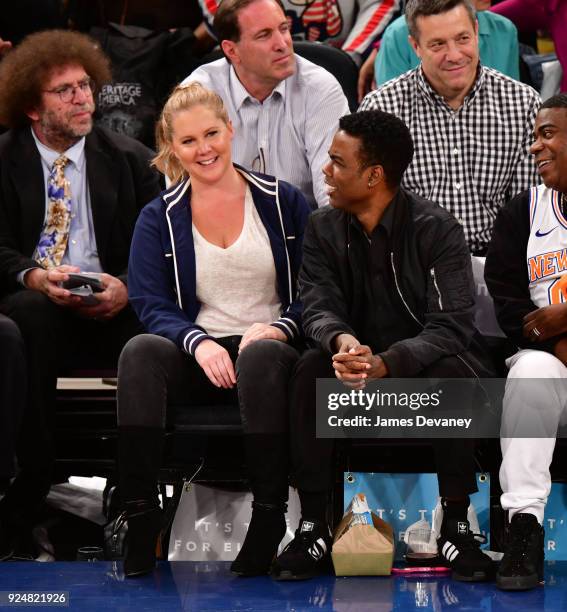 Amy Schumer and Chris Rock attend the New York Knicks Vs Golden State Warriors game at Madison Square Garden on February 26, 2018 in New York City.