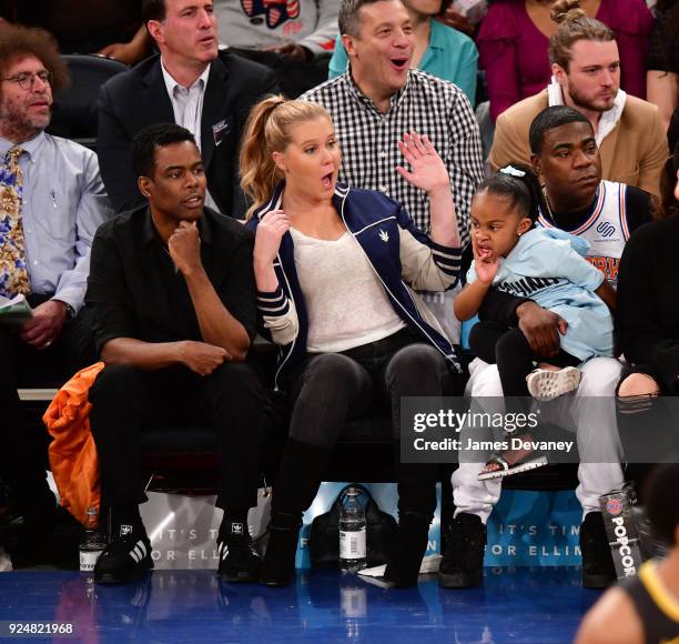 Chris Rock, Amy Schumer, Tracy Morgan and Maven Morgan attend the New York Knicks Vs Golden State Warriors game at Madison Square Garden on February...