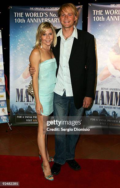 Actress Gigi Edgley and her partner Jamie Mossengren arrive for the premiere of 'Mamma Mia!' at the Lyric Theatre, Star City on October 29, 2009 in...