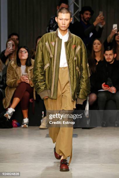 Model walks the runway at the Atsushi Nakashima show during Milan Fashion Week Fall/Winter 2018/19 on February 26, 2018 in Milan, Italy.