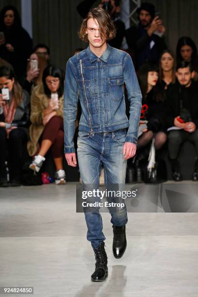 Model walks the runway at the Atsushi Nakashima show during Milan Fashion Week Fall/Winter 2018/19 on February 26, 2018 in Milan, Italy.