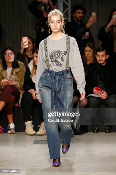 Model walks the runway at the Atsushi Nakashima show during Milan Fashion Week Fall/Winter 2018/19 on February 26, 2018 in Milan, Italy.