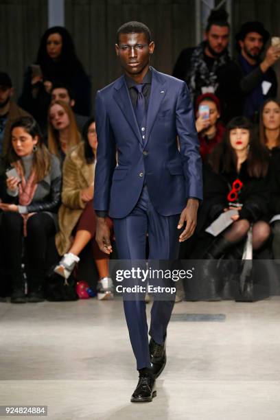 Model walks the runway at the Atsushi Nakashima show during Milan Fashion Week Fall/Winter 2018/19 on February 26, 2018 in Milan, Italy.