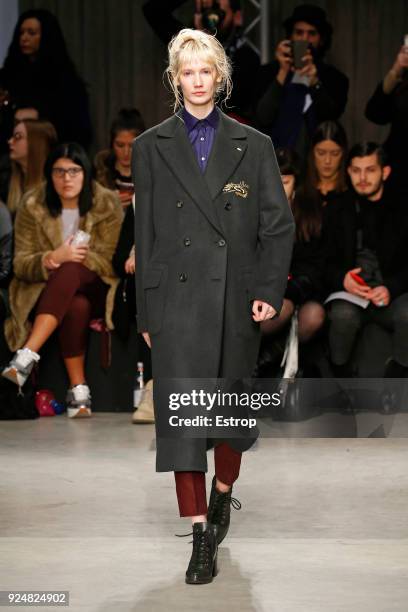 Model walks the runway at the Atsushi Nakashima show during Milan Fashion Week Fall/Winter 2018/19 on February 26, 2018 in Milan, Italy.