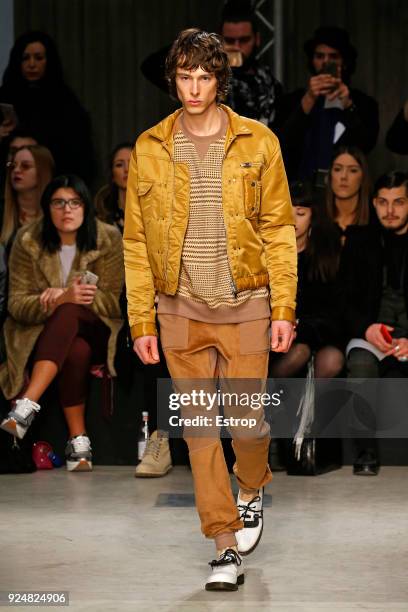 Model walks the runway at the Atsushi Nakashima show during Milan Fashion Week Fall/Winter 2018/19 on February 26, 2018 in Milan, Italy.