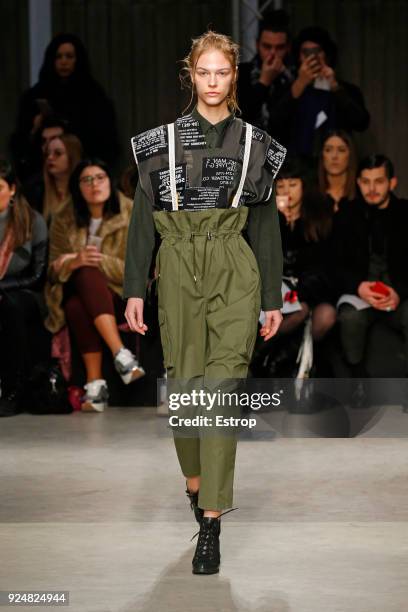 Model walks the runway at the Atsushi Nakashima show during Milan Fashion Week Fall/Winter 2018/19 on February 26, 2018 in Milan, Italy.