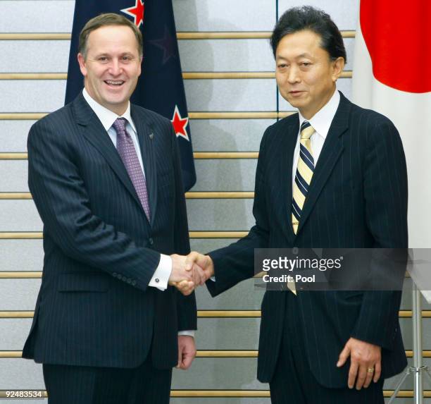 Prime Minister of New Zealand John Key shakes hands with Japanese counterpart Yukio Hatoyama prior to their meeting at the latter's official...