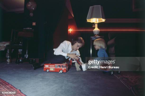 French singer Claude François with his son Claude Francois Junior at home near Fontainebleau , April 1970