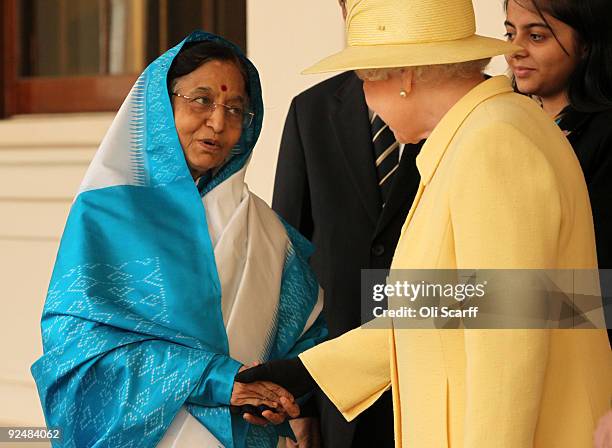 Queen Elizabeth II bids farewell to the President of the Republic of India, Prathibha Devi Singh Patil, in the grounds of Buckingham Palace on...