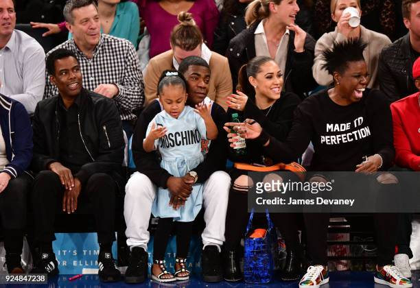 Chris Rock, Tracy Morgan, Maven Morgan, Megan Wollover and Leslie Jones attend the New York Knicks Vs Golden State Warriors game at Madison Square...