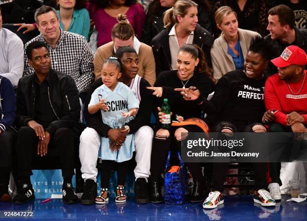 Chris Rock, Tracy Morgan, Maven Morgan, Megan Wollover and Leslie Jones attend the New York Knicks Vs Golden State Warriors game at Madison Square...