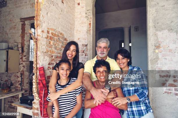 multi-generation cuban family portrait - cuban ethnicity stock pictures, royalty-free photos & images