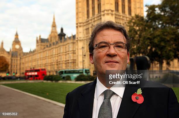 Tony McNulty, a former Minister of State for Employment and Welfare Reform, poses in front of the Houses of Parliament on October 29, 2009 in London,...