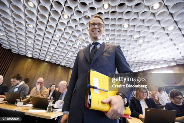 Jens Weidmann, president of the Deutsche Bundesbank, arrives for a news conference to announce the German central banks annual report in Frankfurt,...