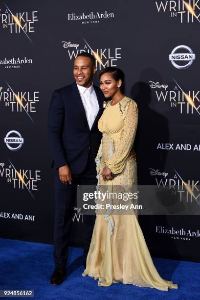 DeVon Franklin and Meagan Good attend Premiere Of Disney's "A Wrinkle In Time" - Arrivals on February 26, 2018 in Los Angeles, California.