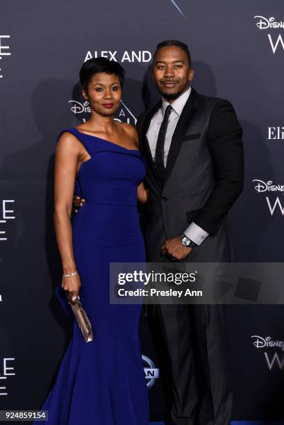 Emayatzy Corinealdi and Jermaine Oliver attend Premiere Of Disney's "A Wrinkle In Time" - Arrivals on February 26, 2018 in Los Angeles, California.