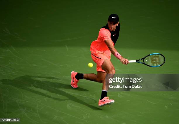 Borna Coric of Croatia plays a backhand during his match against Richard Gasquet of France on day two of the ATP Dubai Duty Free Tennis Championships...