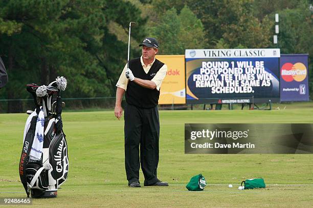 Mark Brooks works out on the driving range after first round play was postponed because of weather in the Viking Classic at the Annandale Golf Club...