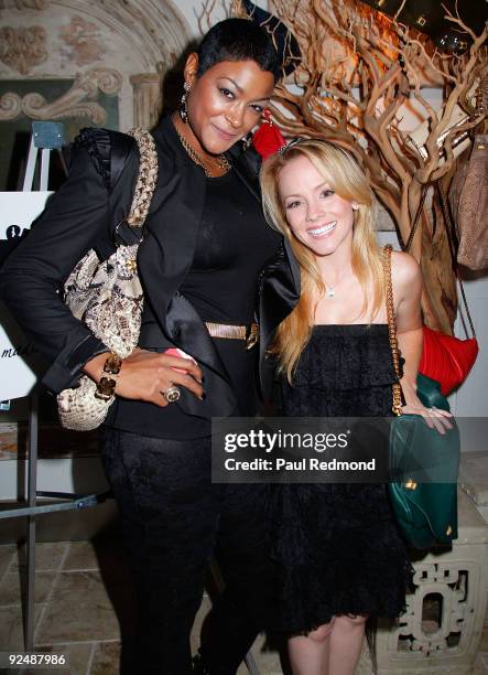 Designer Madison Kelly and actress Kelly Stables attend Genlux Magazine And Ford Models Cocktail Party on October 28, 2009 in Beverly Hills,...