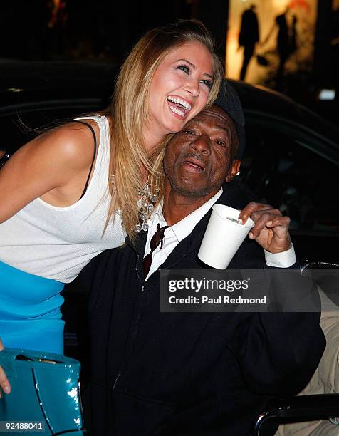 Miss California Tami Farrell with panhandler attend Genlux Magazine And Ford Models Cocktail Party on October 28, 2009 in Beverly Hills, California.