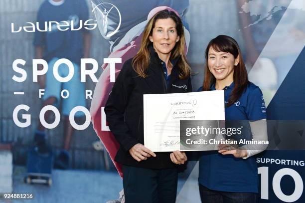 Tennis player and New Laureus Ambassador Al Sugiyama poses with her certificate and Laureus Academy member Monica Seles prior to the Laureus World...