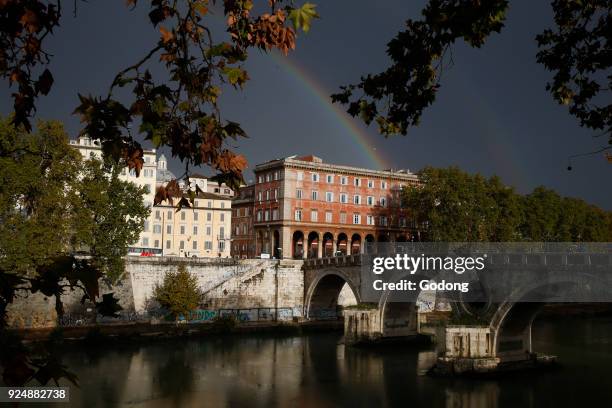 Rainbow over the Sisto bridge, Rome. Italy.