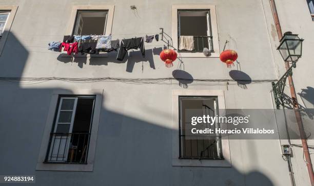 Clotheslines in Mouraria neighborhood on February 24, 2018 in Lisbon, Portugal. Mouraria is one of the city's oldest neighborhoods, where the Moors...