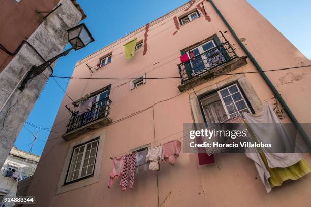 Clotheslines in Mouraria neighborhood on February 24, 2018 in Lisbon, Portugal. Mouraria is one of the city's oldest neighborhoods, where the Moors...