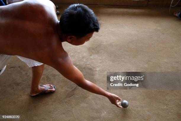 Khmers playing bowls in Battambang. Cambodia.