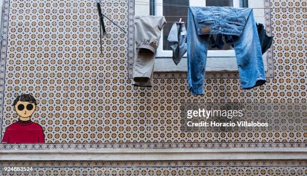 Clotheslines in Mouraria neighborhood on February 24, 2018 in Lisbon, Portugal. Mouraria is one of the city's oldest neighborhoods, where the Moors...