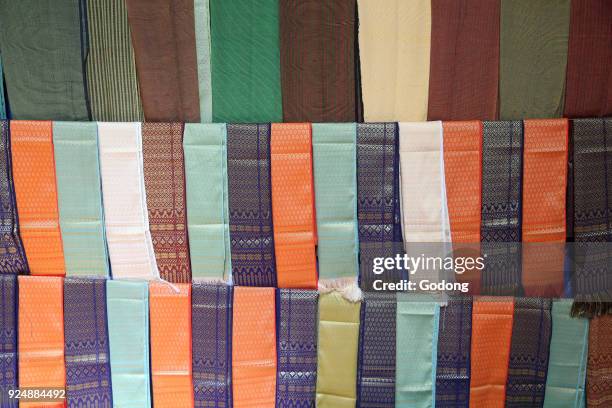 Traditional silk scarves for sale on a market. Dalat. Vietnam.