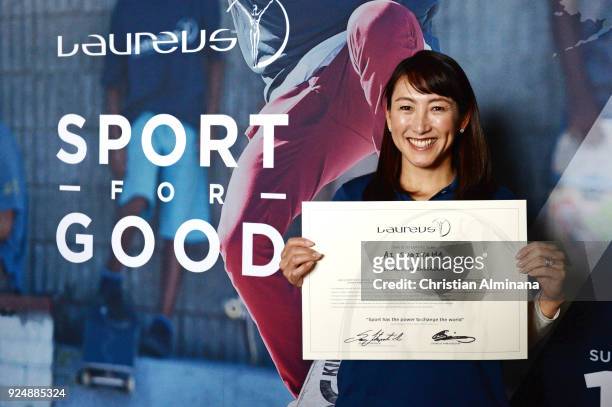 Tennis player and New Laureus Ambassador Ai Sugiyama poses with her certificate prior to the Laureus World Sports Awards at the Meridien Beach Plaza...