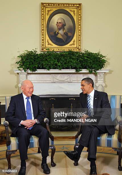 President Barack Obama speaks during a meeting with Singapore Minister Mentor Lee Kuan Yew October 29, 2009 in the Oval Office of the White House in...