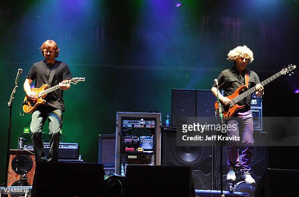 Musicians Trey Anastasio and Mike Gordon of Phish performs on stage during Bonnaroo 2009 on June 12, 2009 in Manchester, Tennessee.