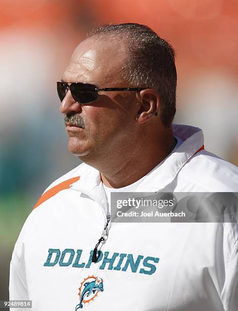 Tony Sparano head coach of the Miami Dolphins watches the team warm up prior to the game against the New Orleans Saints on October 25, 2009 at...