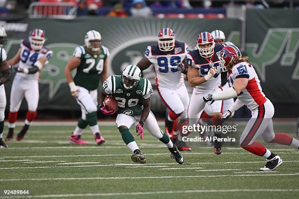 Running back Leon Washington of the New York Jets has a long run against the Buffalo Bills at Giants Stadium on October 18, 2009 in East Rutherford,...