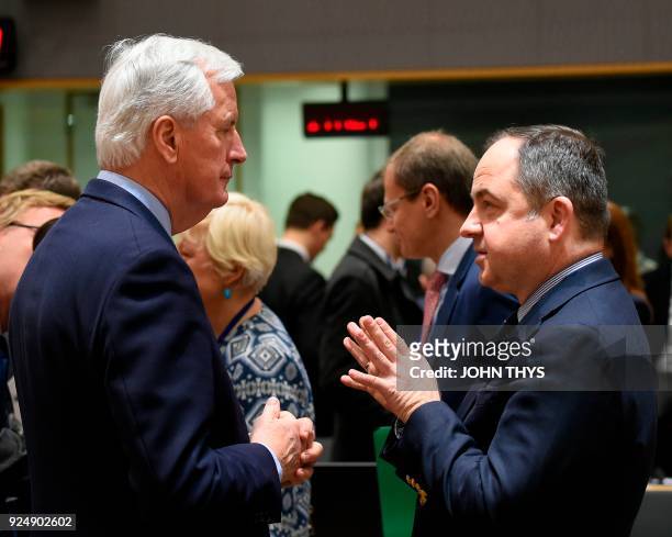 European Union Chief Negotiator in charge of Brexit negotiations, Michel Barnier talks with Konrad Szymanski the Polish European affairs minister...