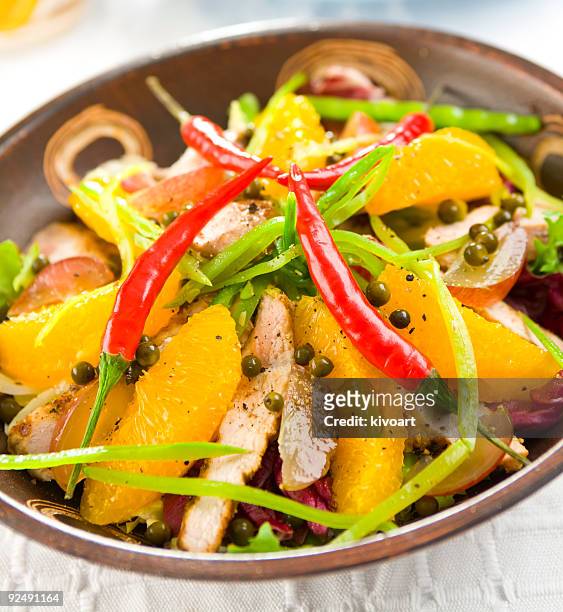 fresh salad with orange - cayenne powder stock pictures, royalty-free photos & images