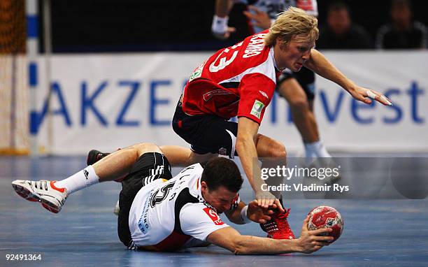 Dominik Klein of Germany and Christoffer Rambo of Norway battle for the ball during the Supercup 2009 game between Germany and Norway at Lanxess...