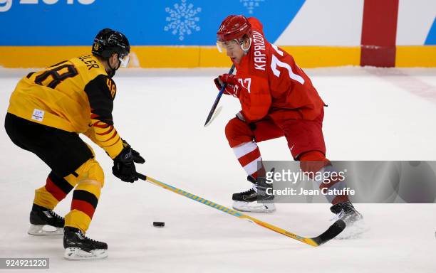 Kirill Kaprizov of Olympic Athlete from Russia, Frank Hordler of Germany during the Men's Ice Hockey Gold Medal match between Germany and Olympic...