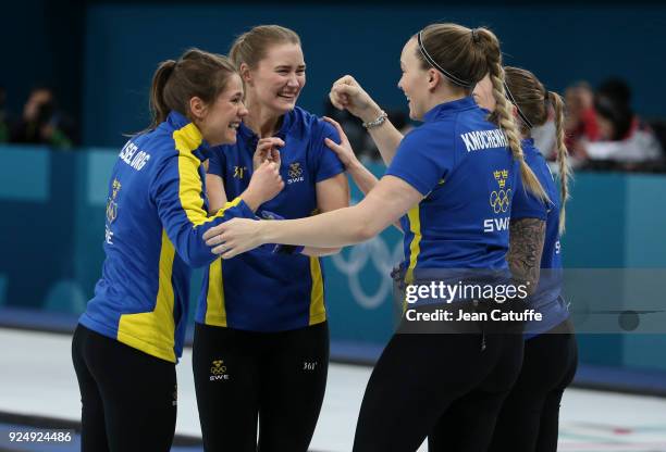 Agnes Knochenhauer, Sara McManus, Anna Hasselborg, Sofia Mabergs of Sweden celebrate winning the gold medal following the Women's Gold Medal game...