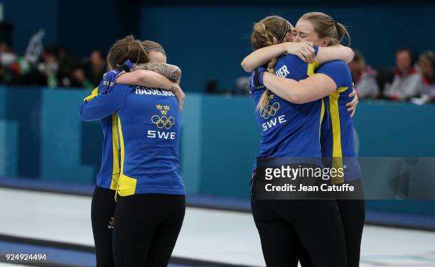 Agnes Knochenhauer, Sara McManus, Anna Hasselborg, Sofia Mabergs of Sweden celebrate winning the gold medal following the Women's Gold Medal game...