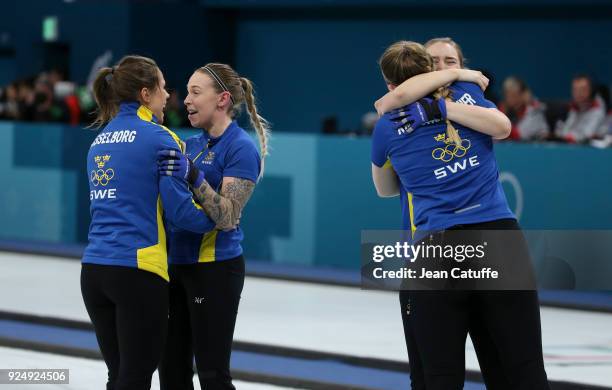 Agnes Knochenhauer, Sara McManus, Anna Hasselborg, Sofia Mabergs of Sweden celebrate winning the gold medal following the Women's Gold Medal game...