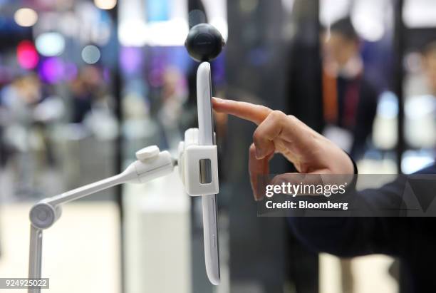 Camera sits mounted on top of a Samsung Electronics Co. Tablet device during day two of the Mobile World Congress in Barcelona, Spain, on Tuesday,...